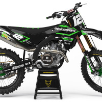 Black Kawasaki Mx Graphics Kit Installed on Kawasaki Dirt Bike Payback