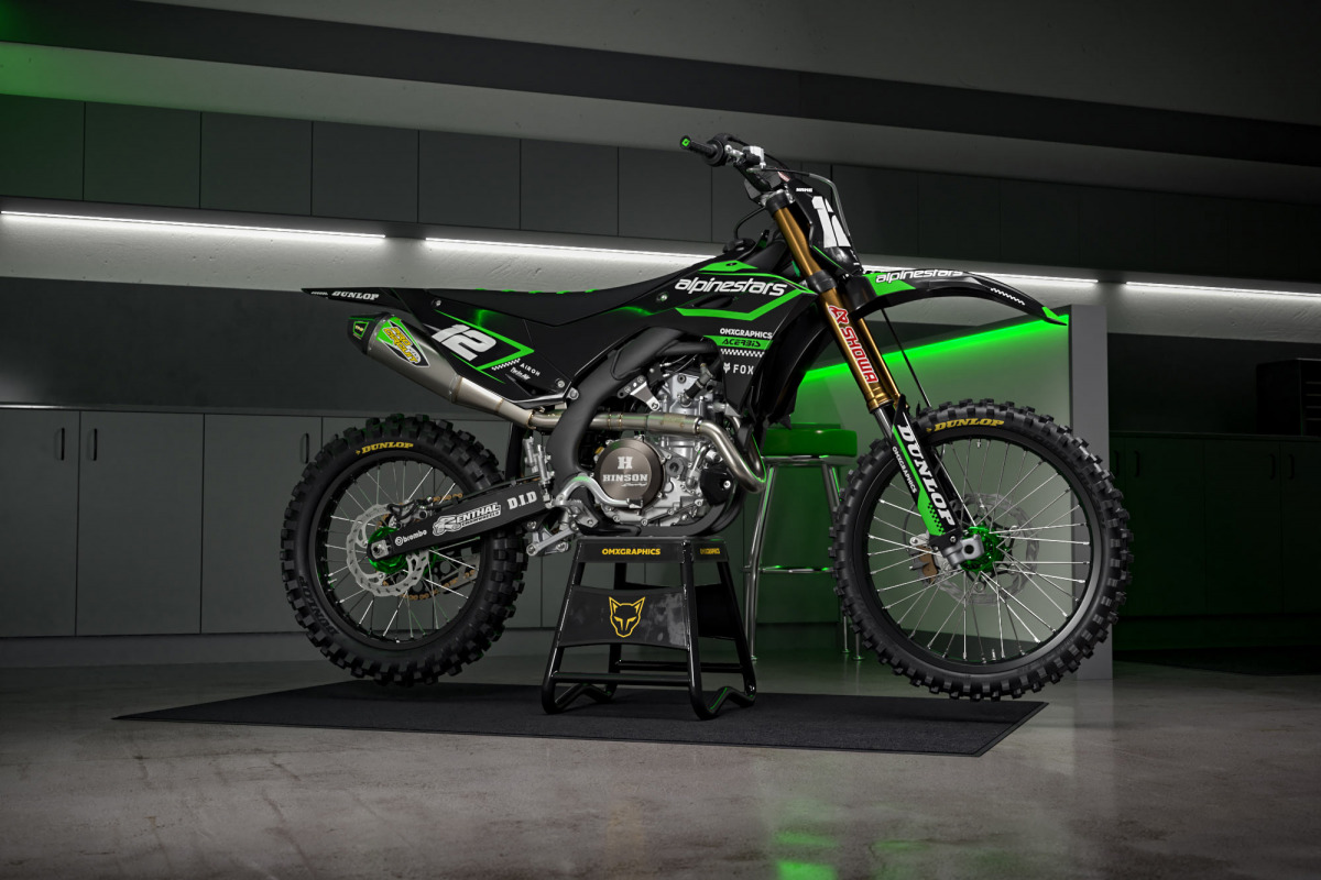 Black Kawasaki Mx Graphics Kit Installed on Kawasaki Dirt Bike Payback Promo