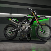 Black Kawasaki Mx Graphics Kit Installed on Kawasaki Dirt Bike Payback Promo
