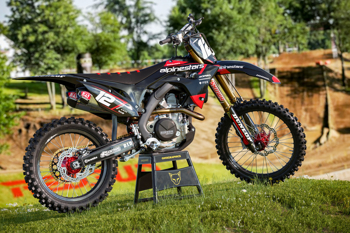 Black Honda Mx Graphics Kit Installed on a Honda Dirt Bike Payback Promo