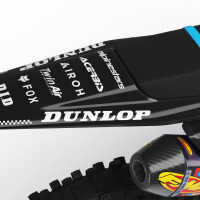 Black Husqvarna Mx Graphics Kit Payback Installed on Husqvarna Dirt Bike 2