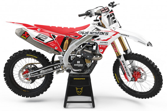 White Suzuki Mx Graphics Kit Installed on Suzuki Dirt Bike Payback