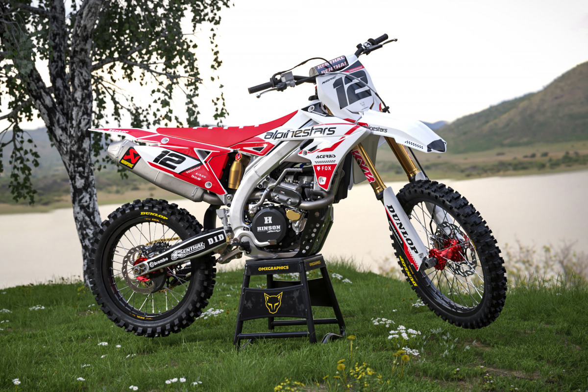 White Suzuki Mx Graphics Kit Installed on Suzuki Dirt Bike Payback Promo
