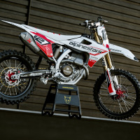 Triumph Dirt Bike Graphics Kit Installed on Triumph MX Bike Payback White Promo