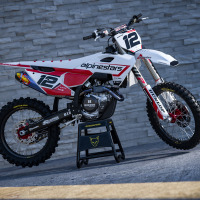 Husqvarna Mx Graphics Kit Installed on Husqvarna Dirt Bike Payback Promo