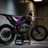 Black Kawasaki Graphics Kit Joker Installed on a Kawasaki Dirt Bike Promo