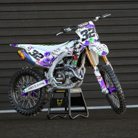 White Kawasaki Graphics Kit Joker Installed on a Kawasaki Dirt Bike Promo