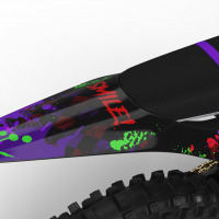 Black Stark Varg Mx Graphics Kit Joker Installed on a Stark Varg Dirt Bike Tail
