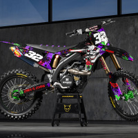 Black Suzuki Mx Graphics Kit Joker Installed on a Suzuki Dirt Bike Promo