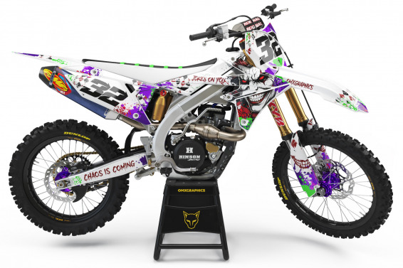 White Suzuki Mx Graphics Kit Joker Installed on a Suzuki Dirt Bike