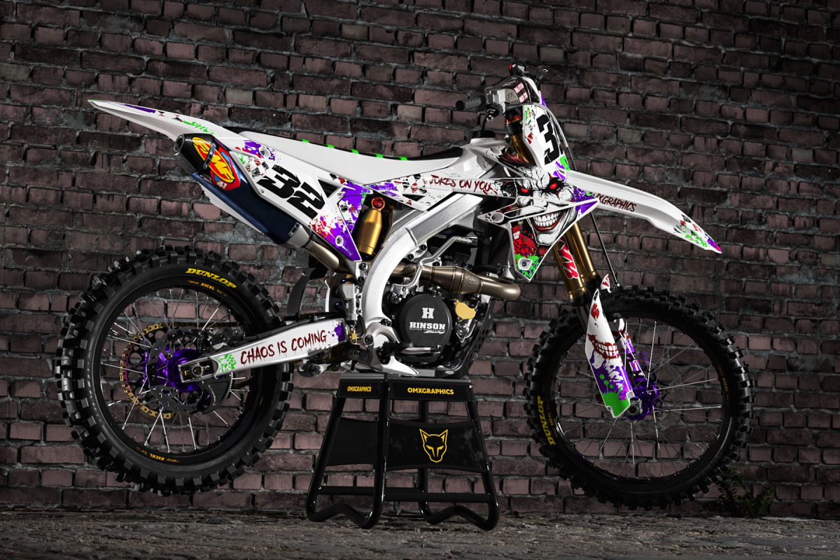 White Suzuki Mx Graphics Kit Joker Installed on a Suzuki Dirt Bike Promo