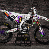 White Suzuki Mx Graphics Kit Joker Installed on a Suzuki Dirt Bike Promo