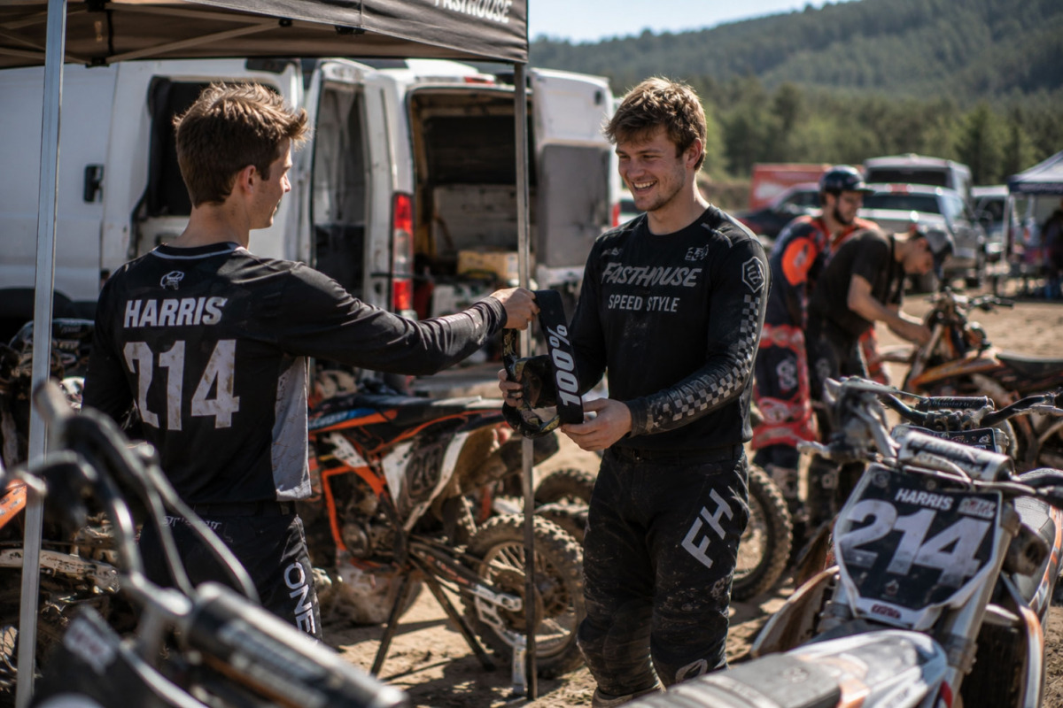 Dirt Bike Riders Sharing Stuff With Each other